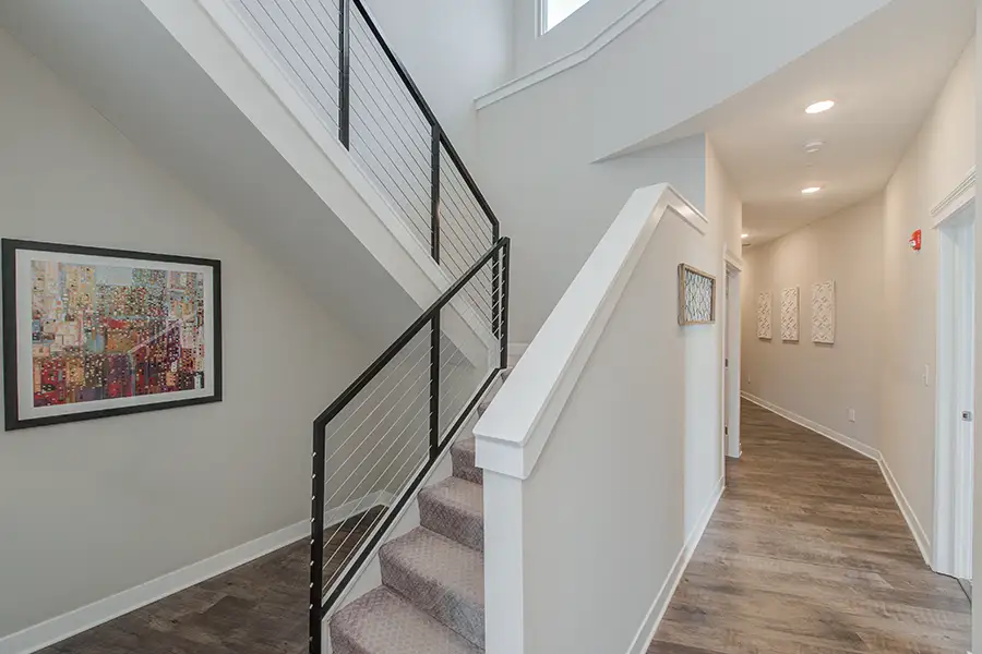 If there are stairs in your apartment or building like these at Penrose On Mass Ave Apartments, keep them clutter-free for possible evacuations. Stairs in a modern apartment